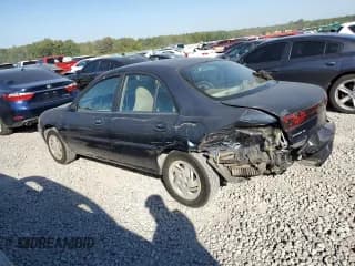 ✅ 2001 Ford Escort Fleet • VIN: 3FAFP13PX1R120920 • Lot: 75643024. Listed on Copart with 128,089 mi. Free auction sales archive from the USA and detailed vehicle history report at DreamBid. Image 2.