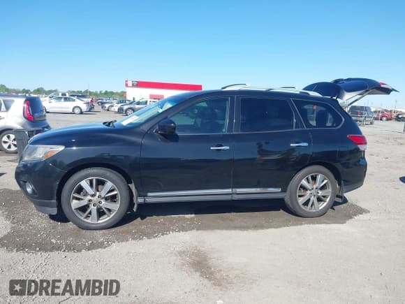 ✅ 2015 Nissan Pathfinder SV • VIN: 5N1AR2MNXFC709386 • Lot: 42010824. Listed on IAAI with 372,260 mi. Free auction sales archive from the USA and detailed vehicle history report at DreamBid. Image 14.