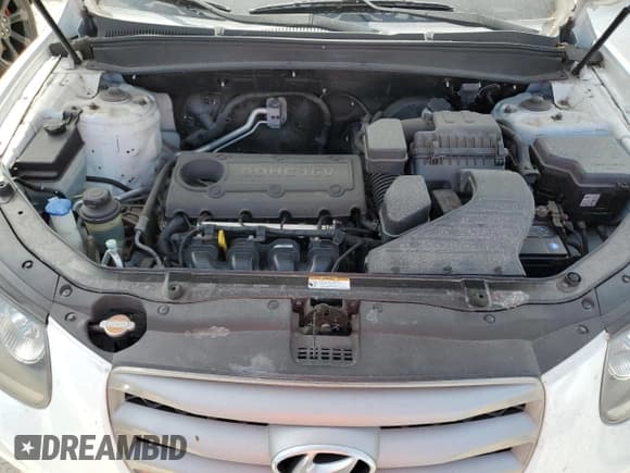 ✅ 2012 Hyundai Santa Fe GLS • VIN: 5XYZGDAB7CG097500 • Lot: 76201154. Listed on Copart with 51,100 mi. Free auction sales archive from the USA and detailed vehicle history report at DreamBid. Image 12.