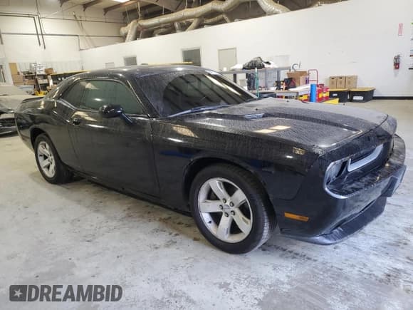 ✅ 2012 Dodge Challenger SXT • VIN: 2C3CDYAG4CH204297 • Lot: 84712494. Wystawiony na Copart z przebiegiem 180 580 mil. Bezpłatny archiwum sprzedaży aukcyjnych z USA i szczegółowy raport historii pojazdu na DreamBid. Zdjęcie 4.