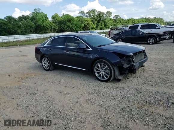 ✅ 2015 Cadillac XTS Luxury • VIN: 2G61M5S32F9169354 • Lot: 54887215. Listed on Copart with 138,795 mi. Free auction sales archive from the USA and detailed vehicle history report at DreamBid. Image 13.