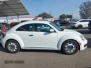 ✅ 2015 Volkswagen Beetle Fleet Edition • VIN: 3VWF17AT0FM607009 • Lot: 41232977. Listed on IAAI with 92,531 mi. Free auction sales archive from the USA and detailed vehicle history report at DreamBid. Image 13.