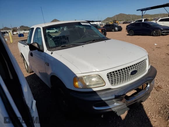 ✅ 1997 Ford F-150 • VIN: 1FTDX17W5VKB78253 • Lot: 87024415. Listed on Copart with 303,843 mi. Free auction sales archive from the USA and detailed vehicle history report at DreamBid. Image 4.