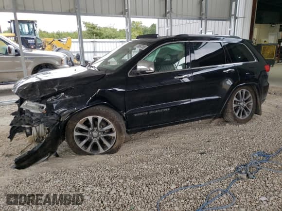 ✅ 2017 Jeep Grand Cherokee Overland • VIN: 1C4RJFCG2HC800339 • Lot: 70897085. Listed on Copart with 168,113 mi. Free auction sales archive from the USA and detailed vehicle history report at DreamBid. Image 1.