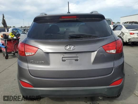 2015 Hyundai Tucson SE with VIN KM8JU3AG7FU011354, listed as a Copart auction lot 91417775 with 144,474 mi miles and Clean title. Bid and sale history available at DreamBid. Image 6.