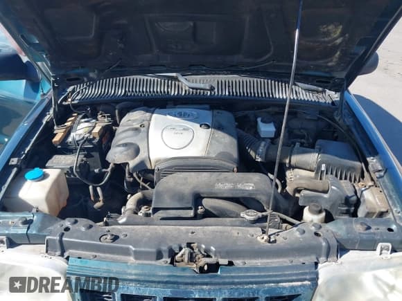 ✅ 2002 Kia Sportage • VIN: KNDJA723925120001 • Lot: 41931419. Listed on IAAI with 145,675 mi. Free auction sales archive from the USA and detailed vehicle history report at DreamBid. Image 10.