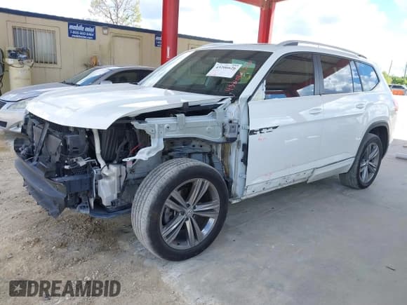 ✅ 2018 Volkswagen Atlas SEL • VIN: 1V2SR2CA7JC561180 • Lot: 43206626. Wystawiony na IAAI z przebiegiem 126 147 mil. Bezpłatny archiwum sprzedaży aukcyjnych z USA i szczegółowy raport historii pojazdu na DreamBid. Zdjęcie 2.