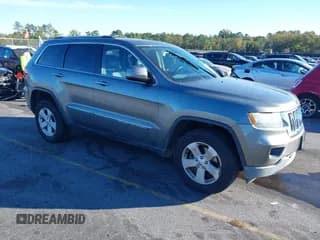 ✅ 2013 Jeep Grand Cherokee Laredo • VIN: 1C4RJFAG5DC560586 • Lot: 43523030. Listed on IAAI with 152,089 mi. Free auction sales archive from the USA and detailed vehicle history report at DreamBid. Image 1.