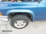 ✅ 2004 Dodge Dakota SLT • VIN: 1D7HG48NX4S585546 • Lot: 41836690. Wystawiony na IAAI z przebiegiem 191 735 mil. Bezpłatny archiwum sprzedaży aukcyjnych z USA i szczegółowy raport historii pojazdu na DreamBid. Zdjęcie 12.