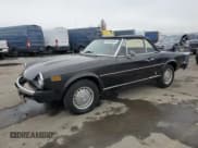 ✅ 1975 FIAT 124 Spider • VIN: 124CS10095845 • Lot: 86344634. Listed on Copart with 86,863 mi. Free auction sales archive from the USA and detailed vehicle history report at DreamBid. Image 1.