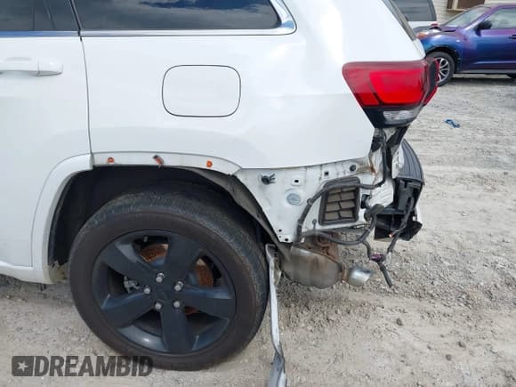 ✅ 2015 Jeep Grand Cherokee Laredo • VIN: 1C4RJEAG7FC143838 • Lot: 42276658. Listed on IAAI with 135,441 mi. Free auction sales archive from the USA and detailed vehicle history report at DreamBid. Image 18.