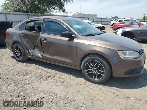 ✅ 2014 Volkswagen Jetta TDI w/Premium/Nav • VIN: 3VWLL7AJ4EM309671 • Lot: 53922295. Listed on Copart with 224,587 mi. Free auction sales archive from the USA and detailed vehicle history report at DreamBid. Image 4.