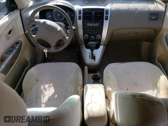 2007 Hyundai Tucson SE z VIN KM8JN72D27U640529, wystawiony jako Copart lot #72318784 z przebiegiem Nie podano mil oraz Szkoda całkowita • Salvage title. Historia ofert i sprzedaży dostępna na DreamBid. Obrazek 8.