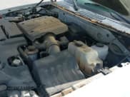 ✅ 2014 Lincoln Navigator • VIN: 5LMJJ2H54EEL05940 • Lot: 42698204. Listed on IAAI with 131,716 mi. Free auction sales archive from the USA and detailed vehicle history report at DreamBid. Image 21.