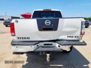 ✅ 2011 Nissan Titan Pro-4X • VIN: 1N6BA0EC0BN301945 • Лот: 58733695. Опубликован ранее на Copart с пробегом 205 752 миль. Бесплатный доступ к архиву аукционных продаж из США и подробный отчёт об истории автомобиля на DreamBid. Изображение 6.