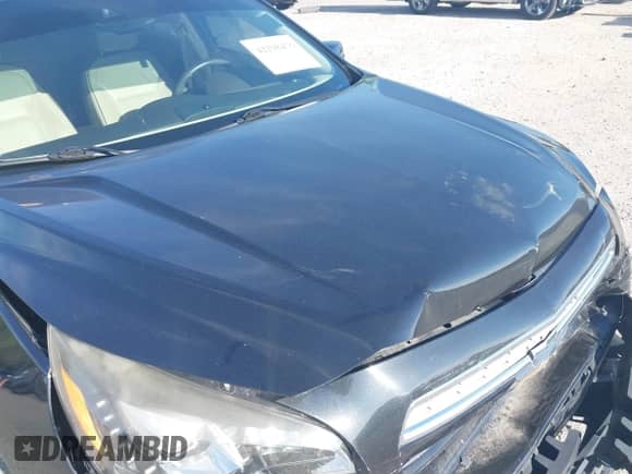 2013 Chevrolet Malibu LTZ with VIN 1G11J5SX7DF248296, listed as a IAAI auction lot 42298476 with 125,337 mi miles and . Bid and sale history available at DreamBid. Image 10.