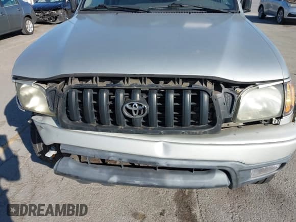 ✅ 2002 Toyota Tacoma PreRunner • VIN: 5TESN92N22Z036458 • Lot: 43032856. Listed on IAAI with 127,929 mi. Free auction sales archive from the USA and detailed vehicle history report at DreamBid. Image 6.