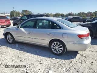 2006 Hyundai Azera SE z VIN KMHFC46F16A048898, wystawiony jako Copart lot #77953824 z przebiegiem 110 623 mil mil oraz Szkoda całkowita • Salvage title. Historia ofert i sprzedaży dostępna na DreamBid. Obrazek 2.