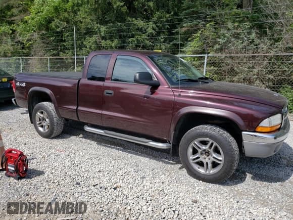 ✅ 2004 Dodge Dakota SLT • VIN: 1D7HG42N14S749128 • Lot: 60733654. Listed on Copart with 101,249 mi. Free auction sales archive from the USA and detailed vehicle history report at DreamBid. Image 4.