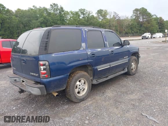 ✅ 2003 Chevrolet Tahoe LS • VIN: 1GNEC13Z13J117508 • Lot: 42654839. Listed on IAAI with 270,213 mi. Free auction sales archive from the USA and detailed vehicle history report at DreamBid. Image 4.