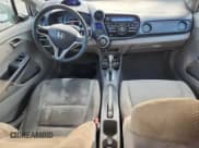 ✅ 2010 Honda Insight LX • VIN: JHMZE2H56AS043475 • Lot: 80628885. Wystawiony na Copart z przebiegiem 152 966 mil. Bezpłatny archiwum sprzedaży aukcyjnych z USA i szczegółowy raport historii pojazdu na DreamBid. Zdjęcie 8.