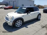 ✅ 2004 MINI Hardtop S • VIN: WMWRE33454TD78702 • Lot: 61276765. Listed on Copart with 192,445 mi. Free auction sales archive from the USA and detailed vehicle history report at DreamBid. Image 1.