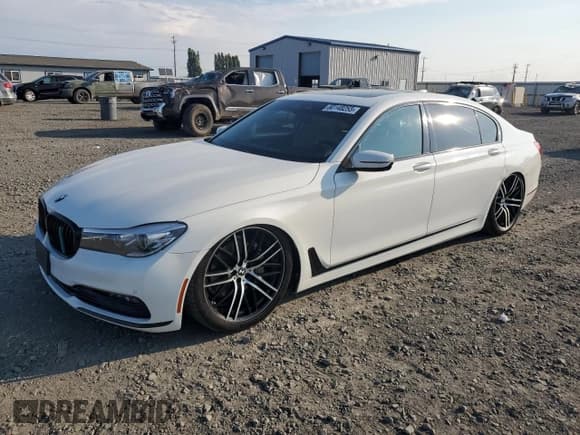 ✅ 2016 BMW 7 Series 740i • VIN: WBA7E2C52GG547305 • Лот: 80148255. Опубликован ранее на Copart с пробегом 99 952 миль. Бесплатный доступ к архиву аукционных продаж из США и подробный отчёт об истории автомобиля на DreamBid. Изображение 1.