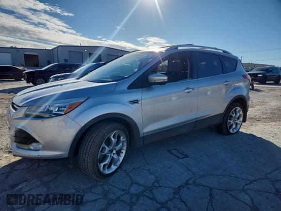 ✅ 2013 Ford Escape Titanium • VIN: 1FMCU0J91DUA59244 • Lot: 90041235. Listed on Copart with 109,309 mi. Free auction sales archive from the USA and detailed vehicle history report at DreamBid. Image 1.