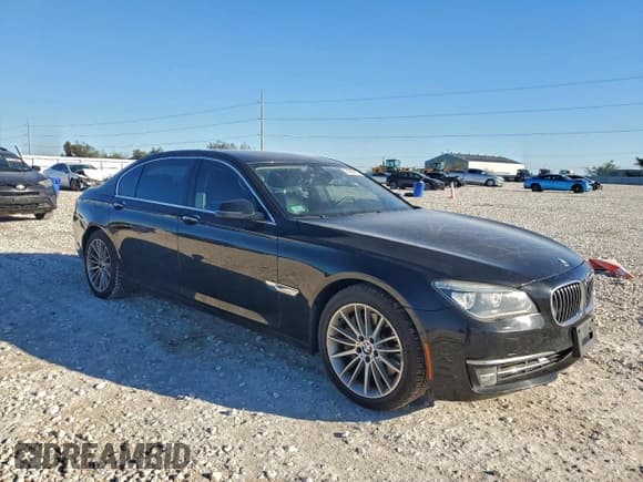 ✅ 2014 BMW 7 Series ALPINA B7 xDrive • VIN: WBAYF8C55ED141764 • Lot: 94592915. Listed on Copart with 97,840 mi. Free auction sales archive from the USA and detailed vehicle history report at DreamBid. Image 4.