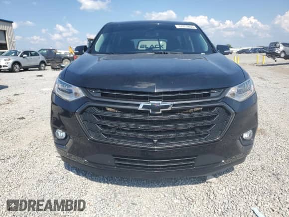 2021 Chevrolet Traverse Premier с VIN 1GNERKKWXMJ269994, выставлен на аукционе Copart как лот 67853835 с пробегом 66 056 миль миль и Списание • Salvage title. История ставок и продаж доступна на DreamBid. Изображение 5.