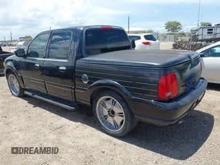 ✅ 2002 Lincoln Blackwood • VIN: 5LTEW05AX2KJ02514 • Лот: 42511022. Опубликован ранее на IAAI с пробегом 129 501 миль. Бесплатный доступ к архиву аукционных продаж из США и подробный отчёт об истории автомобиля на DreamBid. Изображение 3.