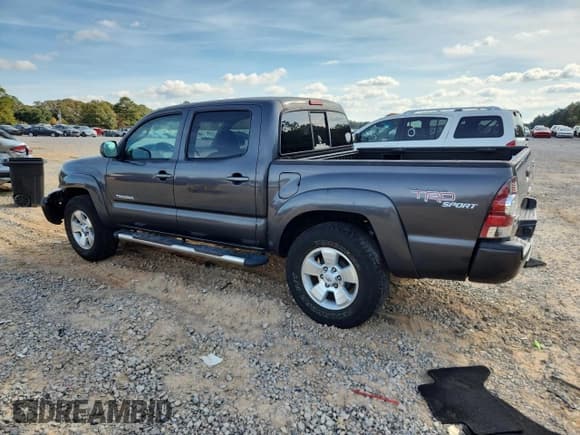 ✅ 2011 Toyota Tacoma PreRunner • VIN: 3TMJU4GN2BM113224 • Lot: 93600255. Listed on Copart with 106,371 mi. Free auction sales archive from the USA and detailed vehicle history report at DreamBid. Image 2.