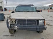 ✅ 1995 Jeep Cherokee Country • VIN: 1J4FJ78S1SL501335 • Lot: 95866195. Listed on Copart with 218,317 mi. Free auction sales archive from the USA and detailed vehicle history report at DreamBid. Image 5.