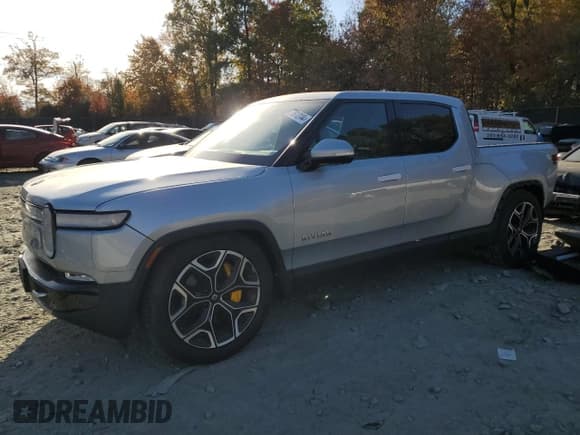 ✅ 2022 Rivian R1T Launch Edition • VIN: 7FCTGAAL6NN002704 • Лот: 77913144. Опубликован ранее на Copart с пробегом 40 665 миль. Бесплатный доступ к архиву аукционных продаж из США и подробный отчёт об истории автомобиля на DreamBid. Изображение 1.