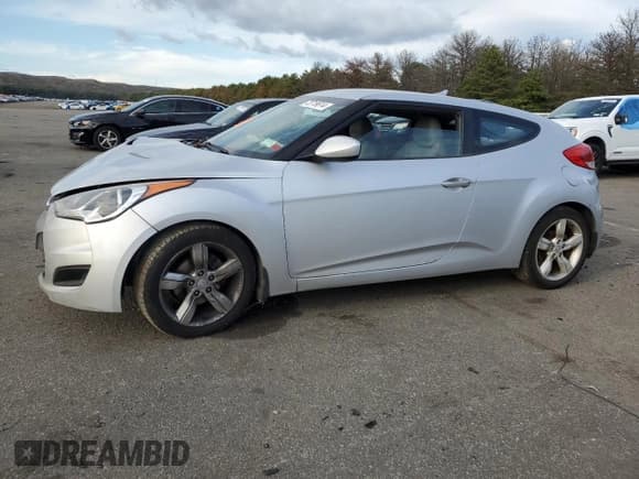 ✅ 2012 Hyundai Veloster w/Red Int • VIN: KMHTC6AD9CU039879 • Lot: 73719614. Listed on Copart with 14,548 mi. Free auction sales archive from the USA and detailed vehicle history report at DreamBid. Image 1.