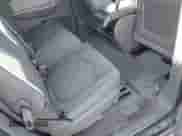 2010 Chevrolet Traverse 1LT z VIN 1GNLVFED5AS117261, wystawiony jako IAAI lot #43220575 z przebiegiem 257 124 mil mil oraz . Historia ofert i sprzedaży dostępna na DreamBid. Obrazek 8.