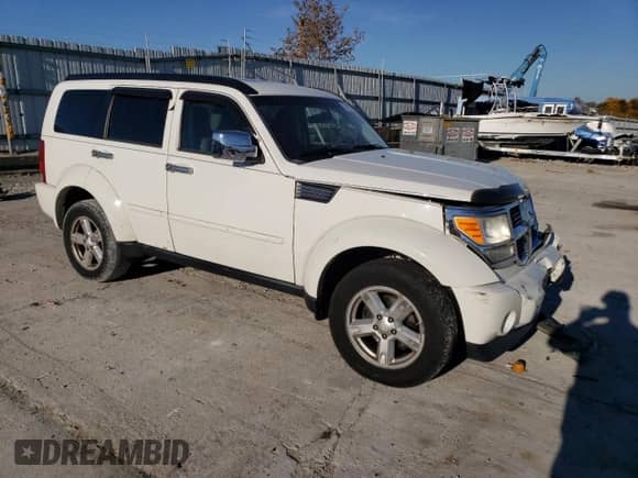 2007 Dodge Nitro SXT с VIN 1D8GU28K37W729848, выставлен на аукционе Copart как лот 77415264 с пробегом 247 756 миль миль и Списание • Salvage title. История ставок и продаж доступна на DreamBid. Изображение 4.