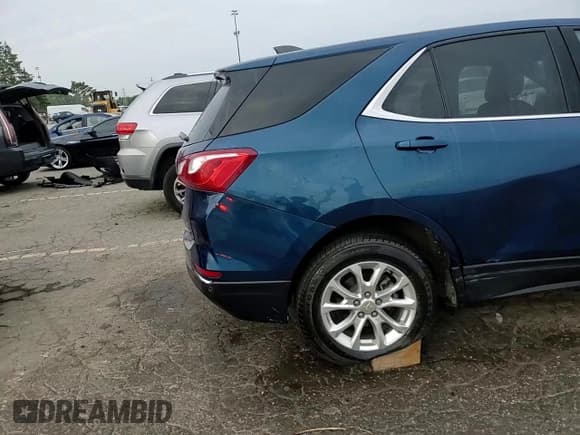 ✅ 2020 Chevrolet Equinox LT • VIN: 2GNAXUEV4L6283372 • Лот: 70697315. Опубликован ранее на Copart с пробегом 99 482 миль. Бесплатный доступ к архиву аукционных продаж из США и подробный отчёт об истории автомобиля на DreamBid. Изображение 14.