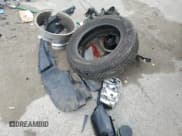 ✅ 2012 Ford Escape Limited • VIN: 1FMCU9EG6CKB17839 • Lot: 54230135. Wystawiony na Copart z przebiegiem 155 834 mil. Bezpłatny archiwum sprzedaży aukcyjnych z USA i szczegółowy raport historii pojazdu na DreamBid. Zdjęcie 13.