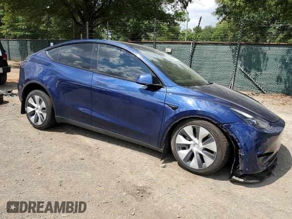 ✅ 2022 Tesla Model Y Long Range • VIN: 7SAYGAEE0NF519750 • Lot: 67638055. Listed on Copart with 51,142 mi. Free auction sales archive from the USA and detailed vehicle history report at DreamBid. Image 4.