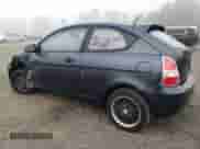 2007 Hyundai Accent GS z VIN KMHCM36C87U004056, wystawiony jako Copart lot #70292314 z przebiegiem 107 760 mil mil oraz Szkoda całkowita • Salvage title. Historia ofert i sprzedaży dostępna na DreamBid. Obrazek 2.