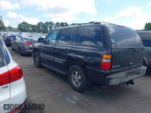✅ 2003 Chevrolet Tahoe LS • VIN: 1GNEC13Z43J140992 • Lot: 42785653. Listed on IAAI with 331,831 mi. Free auction sales archive from the USA and detailed vehicle history report at DreamBid. Image 3.