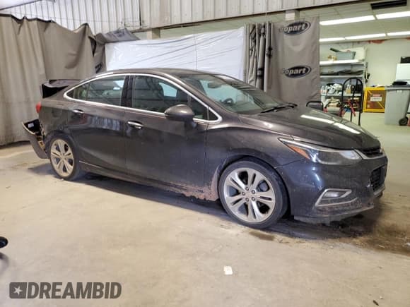 ✅ 2017 Chevrolet Cruze Premier • VIN: 1G1BF5SM9H7118449 • Lot: 68184502. Listed on Copart with 96,367 mi. Free auction sales archive from the USA and detailed vehicle history report at DreamBid. Image 4.
