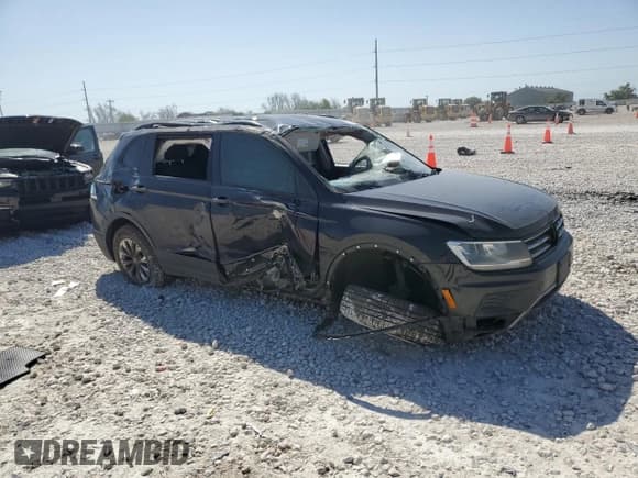 ✅ 2018 Volkswagen Tiguan S • VIN: 3VV1B7AX6JM147216 • Lot: 52449345. Listed on Copart with Not provided. Free auction sales archive from the USA and detailed vehicle history report at DreamBid. Image 4.