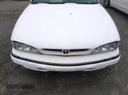✅ 1992 Pontiac Bonneville SSE • VIN: 1G2HZ52L5N1321549 • Lot: 74715344. Wystawiony na Copart z przebiegiem Nie podano. Bezpłatny archiwum sprzedaży aukcyjnych z USA i szczegółowy raport historii pojazdu na DreamBid. Zdjęcie 11.