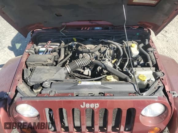 ✅ 2010 Jeep Wrangler Sahara • VIN: 1J4GA5D16AL225139 • Lot: 77114204. Listed on Copart with Not provided. Free auction sales archive from the USA and detailed vehicle history report at DreamBid. Image 12.