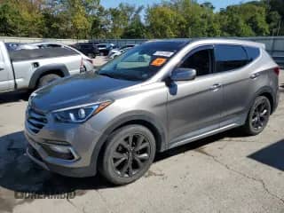 2017 Hyundai Santa Fe Ultimate with VIN 5XYZWDLA8HG489562, listed as a Copart auction lot 71811385 with 72,781 mi miles and Salvage title. Bid and sale history available at DreamBid. Image 1.