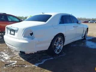 ✅ 2015 Rolls-Royce Ghost • VIN: SCA664S50FUX53044 • Lot: 41884225. Listed on IAAI with 34,778 mi. Free auction sales archive from the USA and detailed vehicle history report at DreamBid. Image 4.