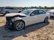 ✅ 2015 BMW 7 Series 750i • VIN: WBAYA8C51FG197604 • Lot: 71919285. Listed on Copart with 165,914 mi. Free auction sales archive from the USA and detailed vehicle history report at DreamBid. Image 1.