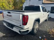 ✅ 2019 GMC Sierra 1500 Denali • VIN: 1GTU9FEL6KZ290420 • Лот: 91506455. Опубликован ранее на Copart с пробегом 130 141 миль. Бесплатный доступ к архиву аукционных продаж из США и подробный отчёт об истории автомобиля на DreamBid. Изображение 3.